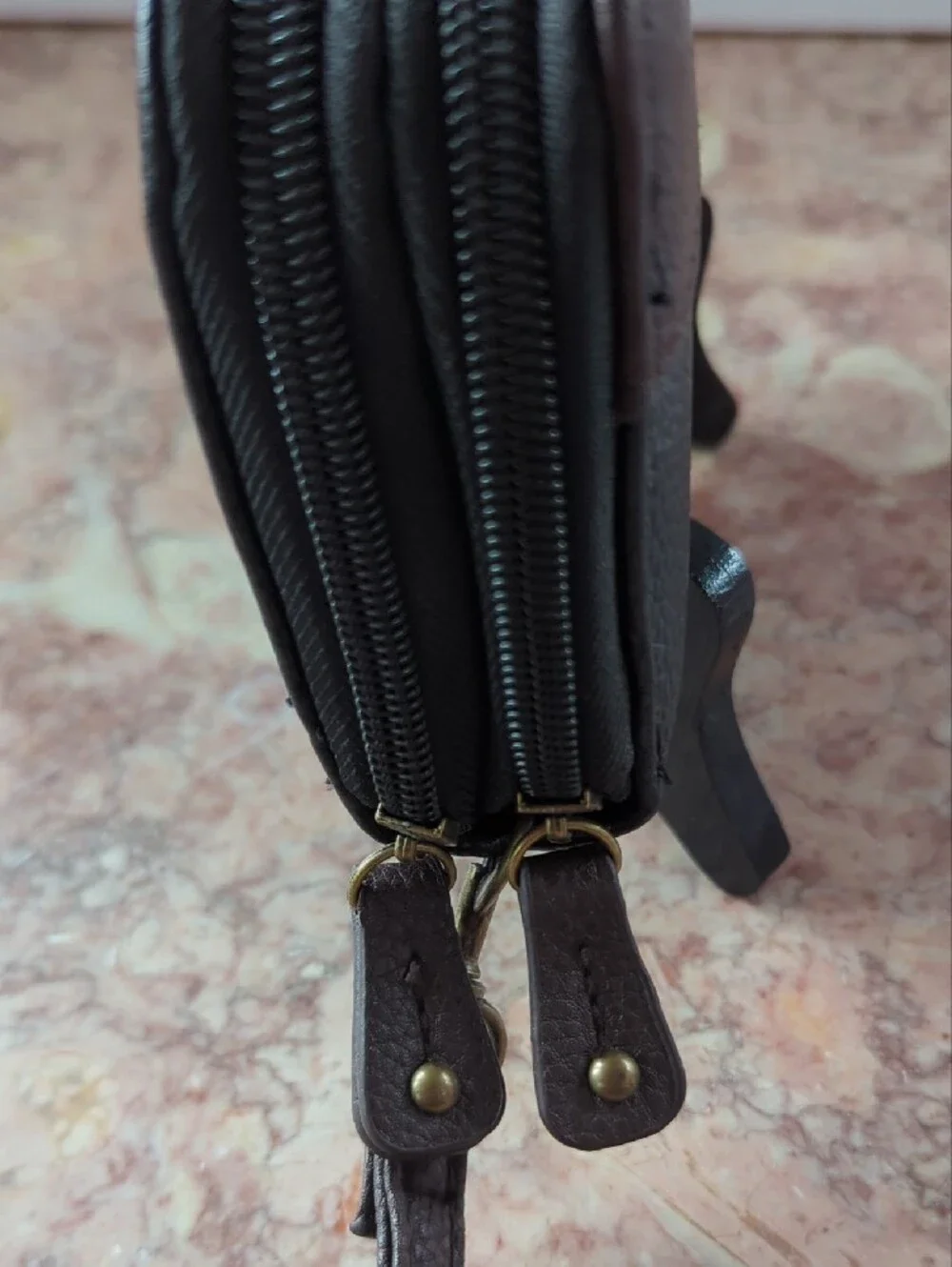 Stone & Co. Black and Brown Leather Wristlet Clutch with Gold Emblem